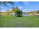 Quaint, well-maintained home with a large, grassy lawn and mature landscaping at 109 Plum Ln., Andrews, SC 29510
