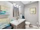 Stylish bathroom featuring a gray vanity and a modern faucet at 1101 Possum Trot Rd. # D201, North Myrtle Beach, SC 29582