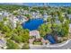 Enjoy the view! Aerial shot of homes and lakes with a breathtaking glimpse of the ocean in the distance at 1108 Surf Pointe Dr., North Myrtle Beach, SC 29582
