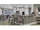 Open kitchen featuring a breakfast bar with granite countertops and seating, stainless steel appliances, and eat-in kitchen at 1108 Surf Pointe Dr., North Myrtle Beach, SC 29582