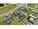 Prime aerial view of a residence with spacious backyard, pool, storage shed and meticulously maintained landscaping at 1205 Cymmer Ct., Conway, SC 29527