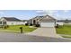 Well-maintained single-story home featuring manicured lawn and an attached two-car garage at 1205 Cymmer Ct., Conway, SC 29527