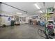 Spacious garage with ample storage, shelving, and room for parking, perfect for hobbyists or extra storage at 1205 Cymmer Ct., Conway, SC 29527