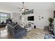 Inviting living room with vaulted ceilings, hardwood floors and adjacent doorways at 1205 Cymmer Ct., Conway, SC 29527