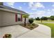 Close up showing walkway to home, landscaping, and small palm tree at 1205 Cymmer Ct., Conway, SC 29527