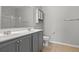 Bathroom boasting double sinks, neutral tile, and a shower with glass door at 121 Parmelee Dr. # D, Murrells Inlet, SC 29576