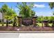 Entrance sign for Parmelee community nestled amidst lush landscaping and colorful flowerbeds at 121 Parmelee Dr. # D, Murrells Inlet, SC 29576