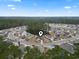 Experience this neighborhood with an aerial view showcasing a home nestled in a tranquil cul-de-sac surrounded by lush greenery at 1222 Midtown Village Dr., Conway, SC 29526