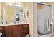 Bright bathroom featuring a vanity with a sink, and a glass door shower at 1222 Midtown Village Dr., Conway, SC 29526