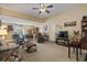 Spacious living room with neutral decor, ample seating, and abundant natural light at 1222 Midtown Village Dr., Conway, SC 29526