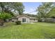 Large backyard featuring a patio and green grass at 1223 Naylor Ave., Myrtle Beach, SC 29577