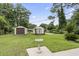 Backyard with storage sheds and landscaping at 1223 Naylor Ave., Myrtle Beach, SC 29577