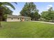 Well-maintained home with lush lawn, mature trees, and inviting curb appeal at 1223 Naylor Ave., Myrtle Beach, SC 29577
