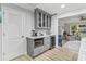 Bright kitchen featuring grey cabinets, marble countertops, and stainless steel appliances at 1223 Naylor Ave., Myrtle Beach, SC 29577