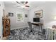 Home office with gray carpet, desk, computer, and bright natural light from a window at 1223 Naylor Ave., Myrtle Beach, SC 29577