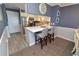 Kitchen area with breakfast bar and view to kitchen at 1310 N Waccamaw Dr. # 102, Garden City Beach, SC 29576