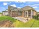 Well-maintained backyard with brick patio and screened in porch at 1410 Bohicket Ct., Myrtle Beach, SC 29579