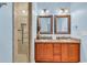 Bathroom featuring a glass shower and double sinks with granite countertops at 1410 Bohicket Ct., Myrtle Beach, SC 29579