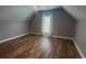 Spacious bedroom with wood floors, a ceiling fan, and lots of natural light at 1410 Bohicket Ct., Myrtle Beach, SC 29579