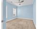 Carpeted bedroom with a ceiling fan and light blue walls at 1410 Bohicket Ct., Myrtle Beach, SC 29579