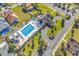 Aerial view of a community pool area with lounge chairs and lush landscaping at 1410 Bohicket Ct., Myrtle Beach, SC 29579