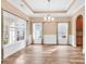 Bright dining area featuring hardwood floors, wainscoting, and natural light at 1410 Bohicket Ct., Myrtle Beach, SC 29579