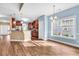 Open-concept kitchen and dining area with wood flooring and natural light at 1410 Bohicket Ct., Myrtle Beach, SC 29579