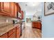 Modern kitchen featuring wood cabinets and stainless steel appliances at 1410 Bohicket Ct., Myrtle Beach, SC 29579