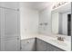 Bathroom featuring a single sink vanity, linen storage, and tile flooring at 157 Egret Run Ln. # 523, Pawleys Island, SC 29585