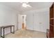 Bright bedroom featuring a ceiling fan, double closet, and neutral carpet at 157 Egret Run Ln. # 523, Pawleys Island, SC 29585