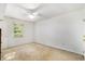 Bedroom with a window, ceiling fan, light carpet, white trim, and neutral walls at 157 Egret Run Ln. # 523, Pawleys Island, SC 29585