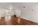 Spacious living room with hardwood floors, a ceiling fan, and abundant natural light at 157 Egret Run Ln. # 523, Pawleys Island, SC 29585