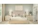 Serene main bedroom with soft lighting, neutral tones, and elegant furnishings at 1704 Hunting Harris Ct # 1, Ocean Isle Beach, NC 28469