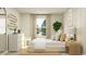 Bright bedroom featuring neutral tones, a large window, and stylish décor at 1708 Hunting Harris Ct # 2, Ocean Isle Beach, NC 28469