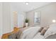 Inviting bedroom with natural light, a cozy bed, and a view to the outside at 172 Ella Kinley Circle # 101, Myrtle Beach, SC 29588