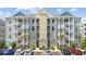 Inviting condo building with multiple units and convenient parking spaces in front at 172 Ella Kinley Circle # 101, Myrtle Beach, SC 29588