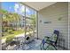 Relaxing screened patio with comfortable seating and views of the lawn at 172 Ella Kinley Circle # 101, Myrtle Beach, SC 29588