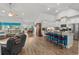 Spacious open-concept living area with a kitchen island, and dining area with modern features, creating an inviting atmosphere at 1833 Lake Egret Dr., North Myrtle Beach, SC 29582