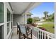 Cozy patio with outdoor seating, offering a charming space to enjoy the neighborhood views and beautiful landscaping at 1833 Lake Egret Dr., North Myrtle Beach, SC 29582