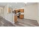 Modern kitchen features stainless steel appliances, wood cabinets, and an open design at 185 Fulbourn Pl., Myrtle Beach, SC 29579
