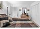 Bedroom featuring neutral tones, wooden dresser, and organized closet space at 1880 Plantation Dr., Myrtle Beach, SC 29577