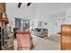 Bright living room with high ceilings, exposed wood beams, and sliding glass doors to a patio at 1880 Plantation Dr., Myrtle Beach, SC 29577