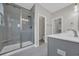Bathroom featuring a walk-in shower with glass door and double sink vanity at 2080 Silver Island Way, Murrells Inlet, SC 29576