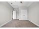 Neutral bedroom featuring plush carpet, double door closet, and adjacent room access at 2080 Silver Island Way, Murrells Inlet, SC 29576