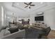 Open-concept living room featuring modern furnishings, stylish decor, and seamlessly connects to dining and kitchen at 2080 Silver Island Way, Murrells Inlet, SC 29576