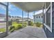 Enjoy the outdoors on this screened-in patio with views of the landscaped backyard and neighboring homes at 2080 Silver Island Way, Murrells Inlet, SC 29576