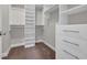 Walk-in closet boasting custom shelving, drawers, and ample storage space at 2080 Silver Island Way, Murrells Inlet, SC 29576