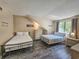 Bedroom featuring two beds, a chest of drawers, and a window at 210 Westleton Dr. # 13-D, Myrtle Beach, SC 29572
