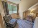 Bedroom with a comfortable chair and window providing natural light at 210 Westleton Dr. # 13-D, Myrtle Beach, SC 29572