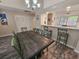 The dining area flows into a pass-through kitchen and breakfast bar with seating at 210 Westleton Dr. # 13-D, Myrtle Beach, SC 29572